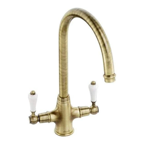 Abode Ludlow Monobloc antique brass dual lever kitchen mixer tap with curved spout and white handles