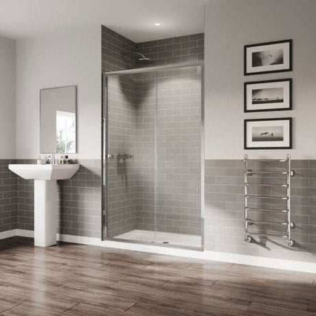 Modern bathroom with Coram 5mm Plain Glass chrome sliding shower door and tiled walls