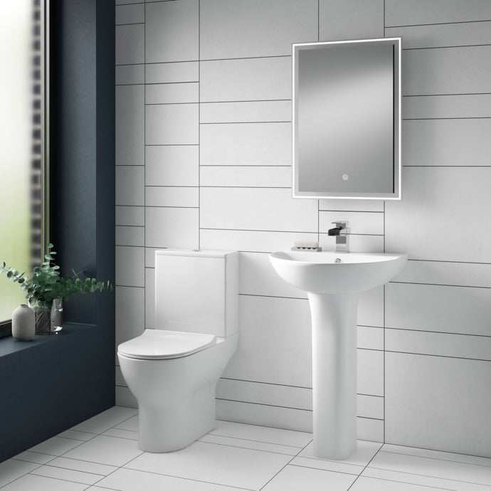 Nuie Freya White 560mm contemporary white pedestal basin with single tap hole in modern bathroom setting