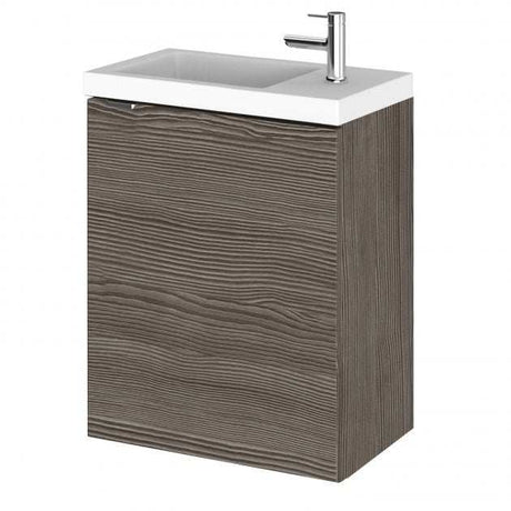 Wall hung vanity unit with compact basin in brown grey Avola finish and single-door storage cabinet