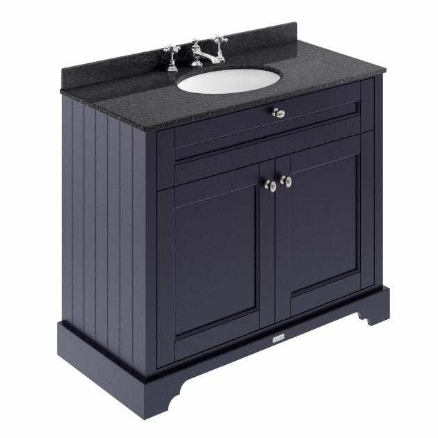 Hudson Reed Old London traditional floor standing vanity unit in twilight blue with black marble top basin and storage cabinets.