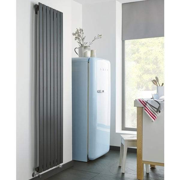 Kartell K-Rad Boston anthracite vertical designer radiator installed in modern kitchen interior