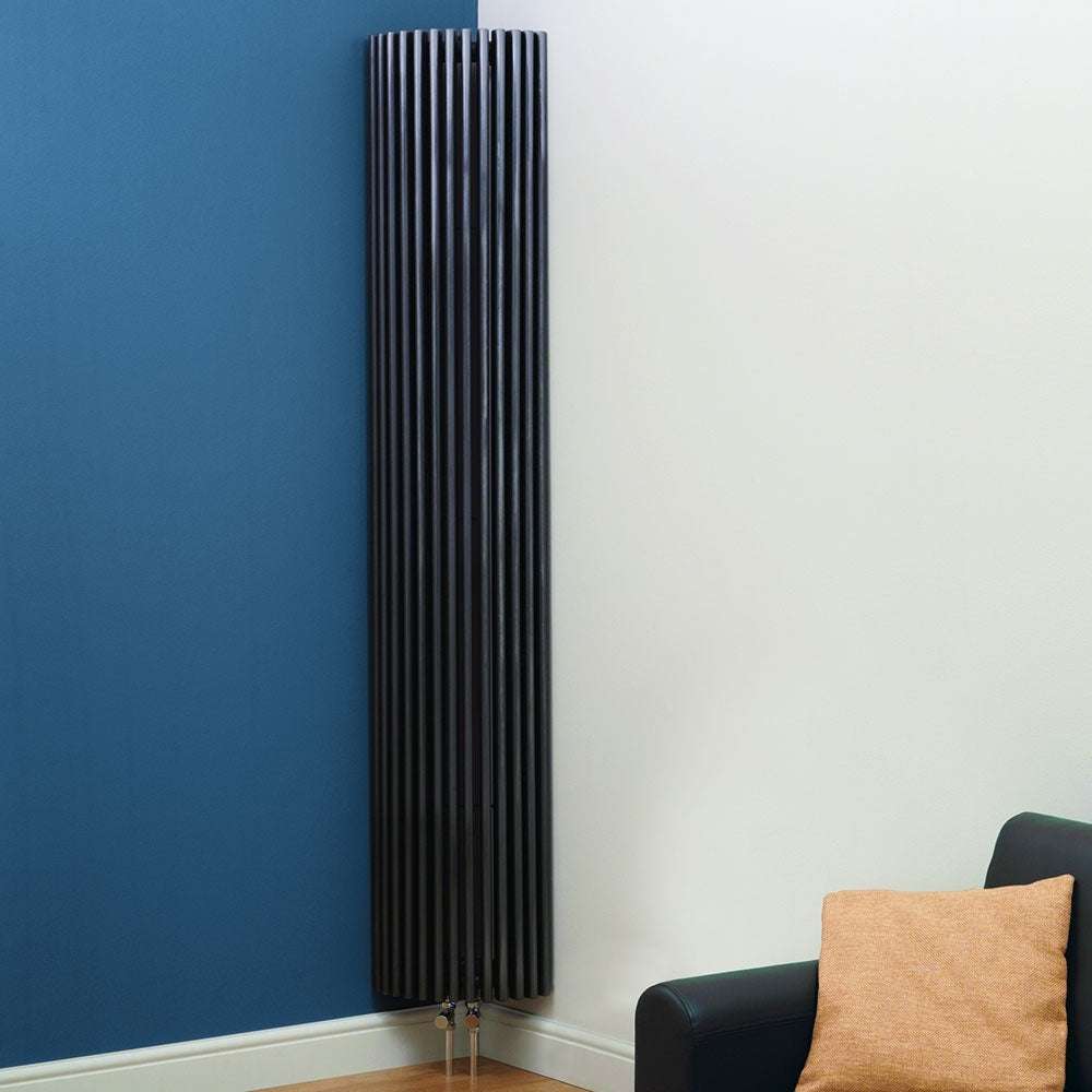 Kartell K-Rad Kansas anthracite vertical designer radiator installed in modern room corner