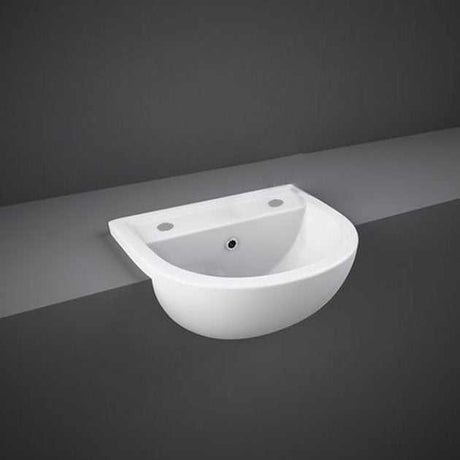 RAK Compact Modern 2 tap hole curved semi recessed basin in Alpine White, 450mm wide, vitreous china bathroom sink