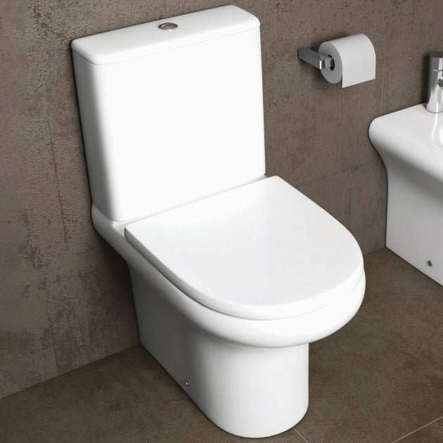 RAK Ceramics white compact close coupled dual flush toilet cistern in modern bathroom