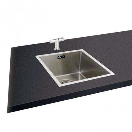 CARRON PHOENIX DECA 100 stainless steel 1 bowl kitchen sink installed in black countertop with modern faucet