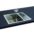 CARRON PHOENIX DECA 150 stainless steel 1.5 bowl kitchen sink with right-hand small bowl installed in black countertop