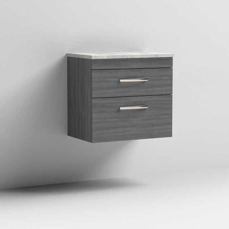 Nuie Athena 600mm wide 2-drawer wall hung vanity unit with grey worktop and brown grey Avola finish.