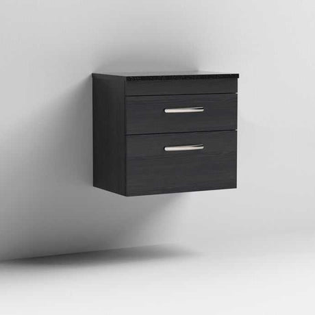 Nuie Athena 2-drawer wall hung vanity in Hacienda Black with sparkling black worktop and silver handles mounted on white wall