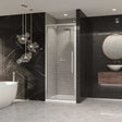 Modern bathroom with Coram 8mm Plain Glass chrome framed pivot shower door and stylish fixtures