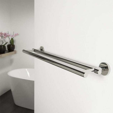 Coram Boston Chrome double towel bar installed in modern bathroom with white wall and bathtub