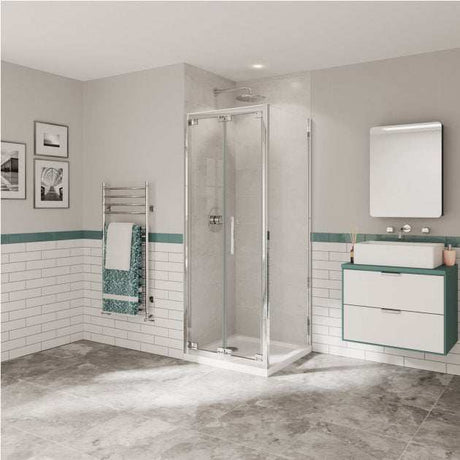 Modern bathroom featuring Coram 6mm Plain Glass Optima 6 Chrome 800mm Bi-Fold Shower Door with polished chrome frame and clear glass