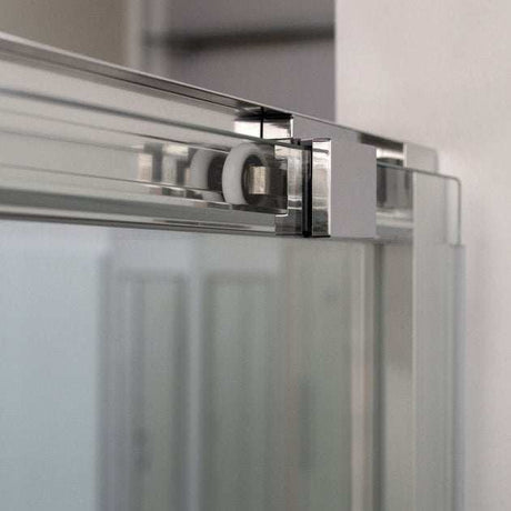 Coram 6mm plain glass clear sliding shower door with chrome frame and rollers close-up