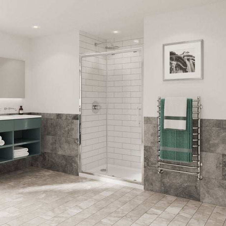 Coram 6mm Plain Glass sliding shower door with chrome frame and polished steel handle in modern bathroom
