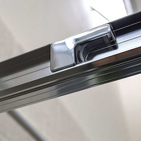 Close-up of chrome aluminium frame and sliding door handle on Coram 6mm Plain Glass shower enclosure