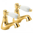 Pair of Deva Georgian Traditional gold basin taps with white ceramic handles