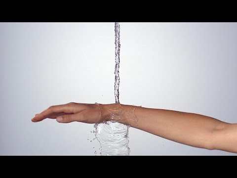 Hand under running water demonstrating water flow for Hansgrohe Rainfinity Hand shower in matt black finish