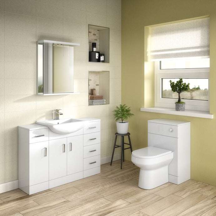 White Nuie Floor Standing Mayford Vanity Unit with 1 tap hole ceramic basin in modern bathroom setting with mirror cabinet and adjacent toilet unit