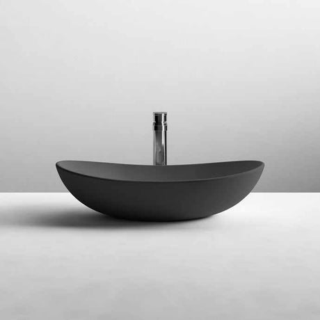 Matt black Nuie Oval Sit-On Vessels countertop basin 615mm wide with modern sleek design