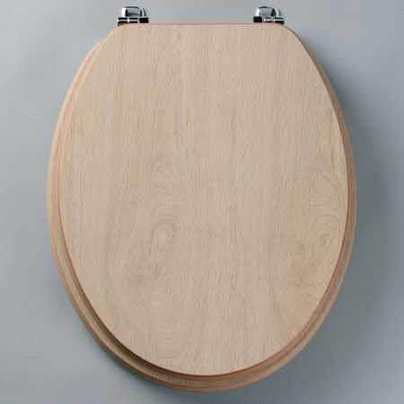 Tavistock Limited Oak Millennium Toilet Seat and Cover in Antique Pine with durable construction and modern design