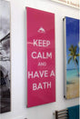 Radox Quartz Bespoke Glass vertical designer radiator in pink with "Keep Calm and Have a Bath" text