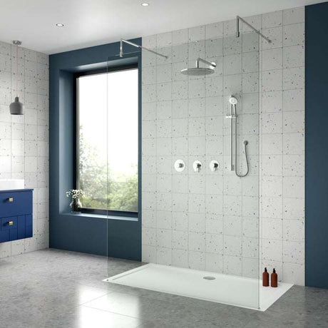 Modern bathroom with Nuie Arvan thermostatic concealed mixer shower, fixed head, and handheld shower kit in a sleek, minimalist tiled enclosure