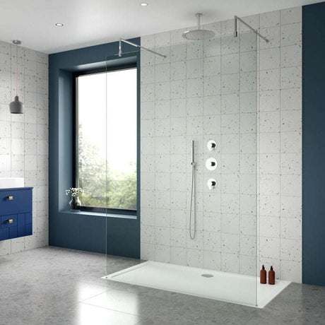 Modern bathroom with Nuie Arvan thermostatic concealed mixer shower featuring fixed head, handheld shower, and stop taps in minimalist design