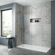 Modern bathroom featuring Nuie Arvan Dual Handle Thermostatic Concealed Shower Valve in brushed brass with glass shower enclosure and gray stone tiles